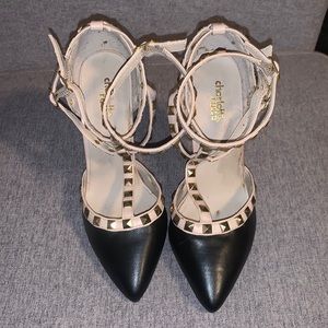 Black and gold pumps